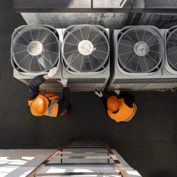 men-working-with-equipment-full-shot (1)