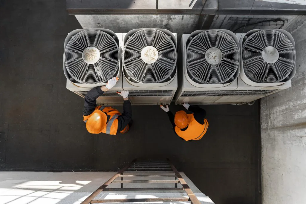 men-working-with-equipment-full-shot (1)